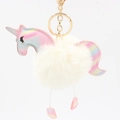 Detail showing white pom-pom unicorn keychain with gold clasp and iridescent accents - Off White