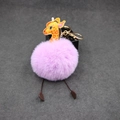Detail of purple faux fur giraffe keychain with golden metal clasp and cartoon giraffe charm - 8cm Faux Rabbit Fur / Taro Purple