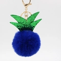 Detail of dark blue pineapple plush keychain with green sequin leaves and gold clasp - Sapphire Blue