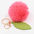 Pink faux fur ball keychain with green leaf pendant and golden metal lobster clasp - Watermelon red