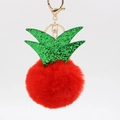 Detail of red plush pineapple keychain with green sequins and gold metal lobster clasp - Red