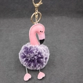 Detail of flamingo keychain with purple faux fur pompom and golden lobster clasp hardware - Two-tone Purple