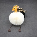 Detail of giraffe plush ball keychain with golden metal clasp and faux fur on grey base - 8cm Faux Rabbit Fur / Off White