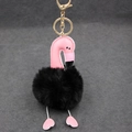 Détail du porte-clés flamant rose en cuir avec pompon noir et mousqueton doré pour sac à main - 8cm / Noir