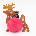 Detail of Christmas reindeer keychain with brown leather, gold antlers and pink pompom - Rose Red
