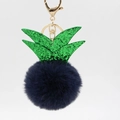 Detail of blue plush pineapple keychain with green glitter leaves and golden metal clasp - Navy Blue