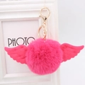 Detail of rose red faux fur pompom keychain with fabric angel wings and gold metal ring - Faux Rabbit Fur / Rose Red
