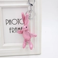 Pink glitter long-eared bunny plush keychain with silver metal clasp on a white frame background - Golden Pink Glitter Rabbit (Without Keychain)