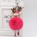 Detail of pink faux fur reindeer keychain with brown antlers and silver metal lobster clasp - Rose Red