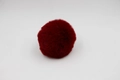Close-up of a 8cm dark red faux rabbit fur pom-pom ball for bags and DIY craft accessories - 8cm Faux Rex Rabbit Ball / Burgundy