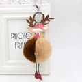 Christmas reindeer plush pompom keychain with festive red hat and silver metal clasp - Coffee and Brown