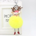 Detail view of reindeer keychain featuring yellow plush pompom and brown leather antlers - Yellow