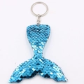 Detail of blue sequin mermaid tail keychain with a polished silver metal ring - Mermaid Tail - Blue