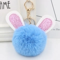 Light blue faux fur pompom keychain with pink glitter bunny ears and golden metal clasp - Gold Key Chain Style / Light Blue