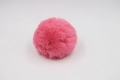 Close-up of a soft pink faux rabbit fur pom pom with fluffy texture for bags and accessories - 8cm Faux Rex Rabbit Ball / Deep Pink