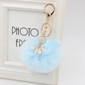 Detail of ballet dancer keychain with sparkling rhinestones and soft light blue faux fur pom - 8cm Faux Fur / Sky Blue