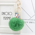 Close-up of fluffy green pompom keychain with rainbow unicorn and golden alloy lobster clasp - Army Green