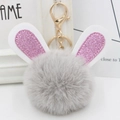 Detail of plush bunny keychain with grey fur pompom and pink glitter ears - Gold Key Chain Style / Light Gray