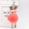 Detail of pink faux fur reindeer keychain with red Santa hat and metal ring clip - Orange