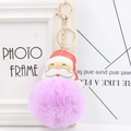 Pink fluffy pom pom keychain with Santa Claus leather charm and golden keyring - Taro Purple