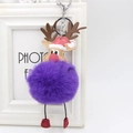 Detailed view of a purple plush reindeer keychain with a red Santa hat and metal clasp - Purple