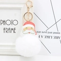Santa Claus keychain with a large white faux fur pompom and golden lobster clasp - White