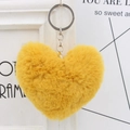 Detailed close-up of fluffy yellow heart plush keychain with silver metallic ring - Silver Single Ring Keychain / Turmeric