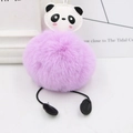 Close-up of a purple faux fur panda pompom keychain with cute artificial leather details - Taro Purple