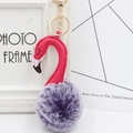 Detail of plush flamingo keychain with purple faux fur ball and golden lobster clasp - Two-Tone Purple and Rose