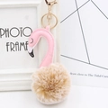 Detail of plush flamingo keychain with brown faux fur ball and golden metal clasp - Two-Tone Khaki and Pink
