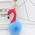 Detailed close-up of pink leather flamingo neck and light blue faux fur pompom keychain - Light Blue and Rose