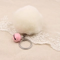 Detail of fluffy white faux fur pompom keychain with pink bell and silver metal ring - 8cm Faux Rabbit Fur With Bell / Off-white