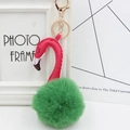 Detail of pink leather flamingo keychain with a green faux fur pompom and gold clip - Army Green and Rose