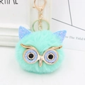 Detailed view of mint green sequin owl plush keychain with golden lobster clasp and rings - Gold Key Chain Style / Mint Green & Blue