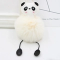 Detail of cute panda plush pom pom keychain with faux fur texture on white background - Off White