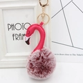 Detailed view of plush flamingo keychain with faux leather design and golden keyring - Two-Tone Wine Red and Rose