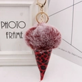 Detail of burgundy leopard print ice cream cone keychain with gold carabiner - Gold Key Chain Style / Two-Tone Red