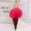 Detail view of pink plush ball keychain with leopard print cone and golden metal ring - Gold Key Chain Style / Rose Red