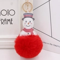 Close-up of snowman faux fur pom-pom keychain with red scarf and gold metal ring clasp - Red