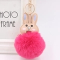 Close-up of cute pink fluffy rabbit keychain with gold lobster clasp and embroidery - Rose Red
