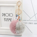 Pink and grey faux fur unicorn pompom keychain with a golden lobster clasp and rainbow motif - Gray And Bean Paste
