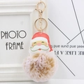 Pinkish-brown faux fur pompom keychain with Santa Claus charm and gold metal ring - Mixed Khaki