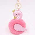 Detailed close-up of pink swan plush keychain with gold crown and leather wings - Dark Pink