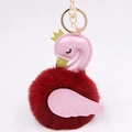 Close-up of swan plush keychain with pink faux leather wings and golden metal clip - Wine Red-Pink