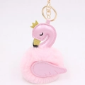 Detailed view of pink swan plush ball keychain with golden crown and lobster clasp - Light Pink