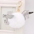 Gros plan du porte-clés licorne en peluche avec ailes pailletées et fermoir doré - Style Chaîne De Clé Or / Blanc