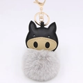 Detailed view of plush pig keychain with black leather face and gold metal clasp - Light Gray