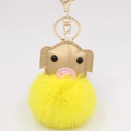 Detailed macro view of yellow fluffy pom pom pig keychain with golden metal hook - Gold 8-shaped Clasp / Yellow Gold