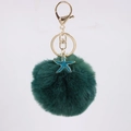 Detailed view of dark green fluffy pompom keychain with teal starfish and gold metal clasp - Dark Green