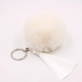 Detailed view of fluffy off-white faux fox fur pom pom with long silky white tassels - 8cm Faux Rabbit Fur Tassel Style / Off White
